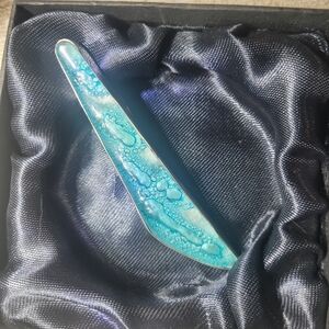 Handmade Mesmorizing Light Blue Bubble Glass Pendant Encased In Sterling Silver.